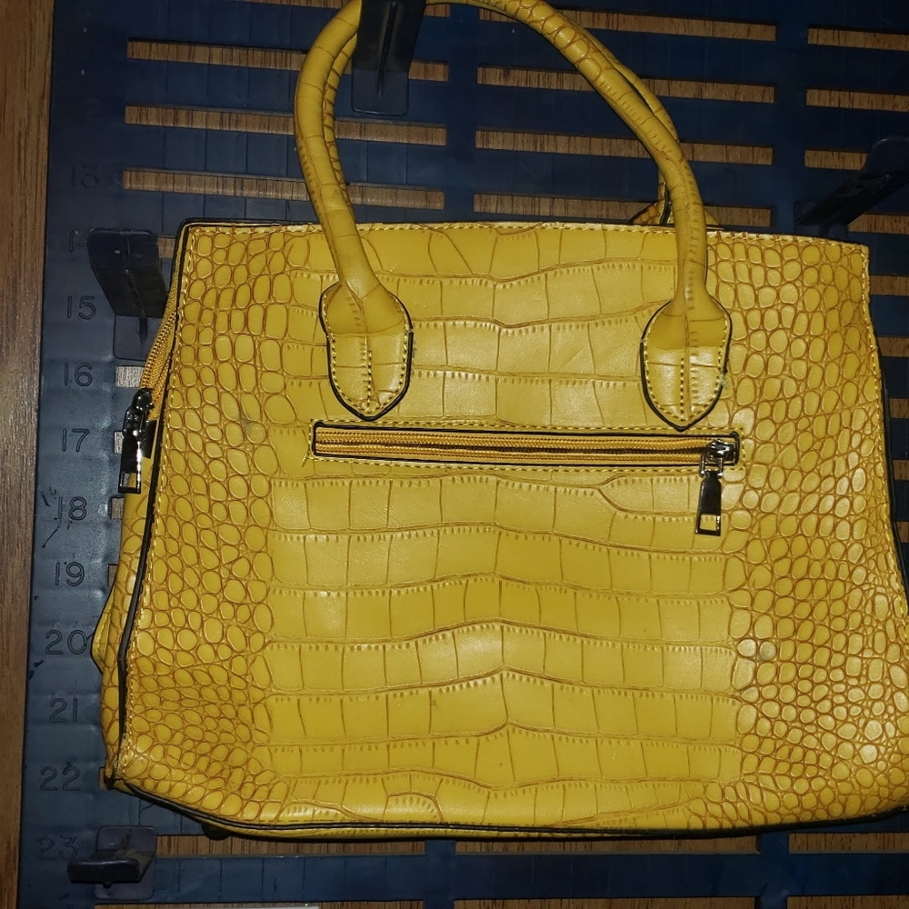 Yellow snakeskin purse